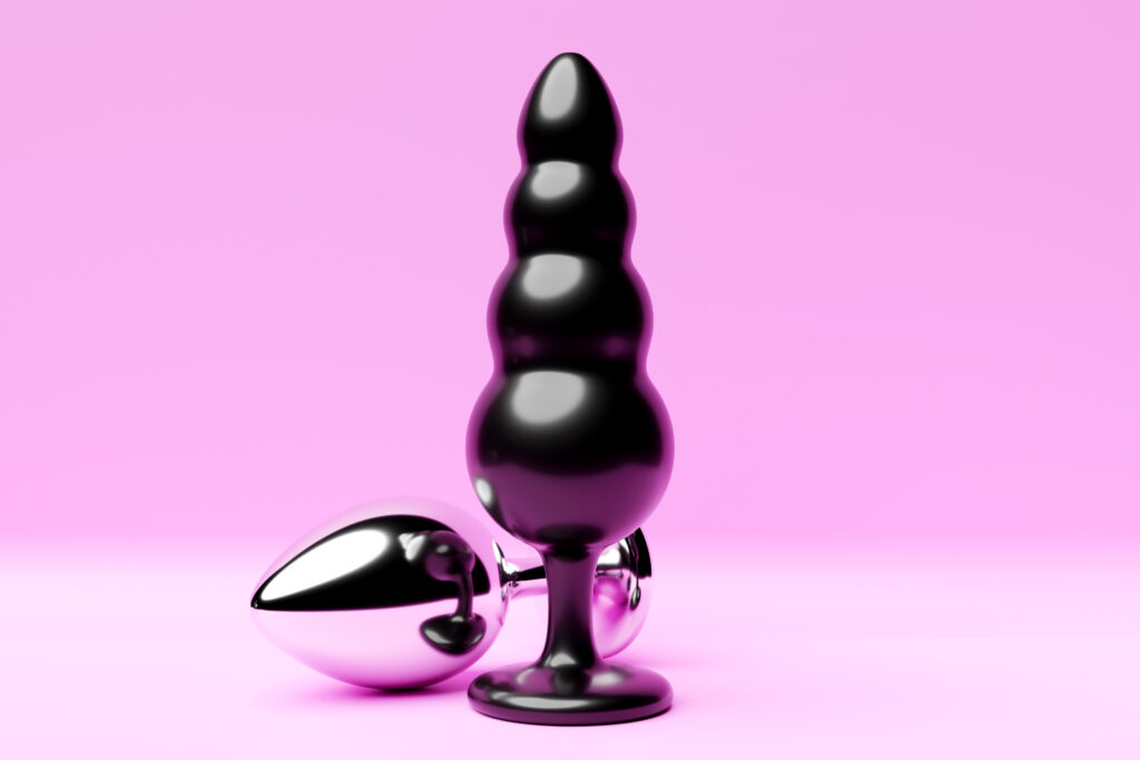 colorful butt anal plugs sex toys pink isolated background 3d illustration empty space your text